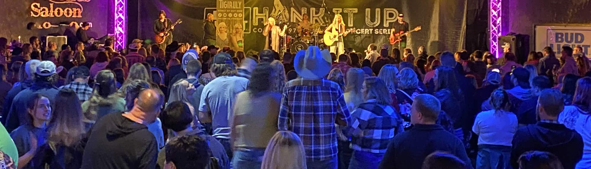 country concert with fans wearing cowboy hats Santa Barbara