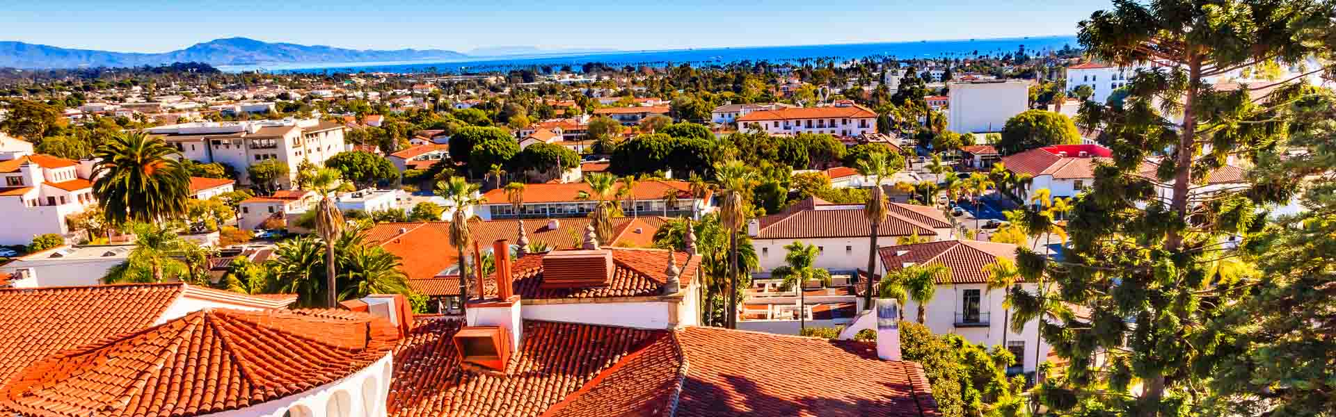 Neon color image of a band playing and people singing along